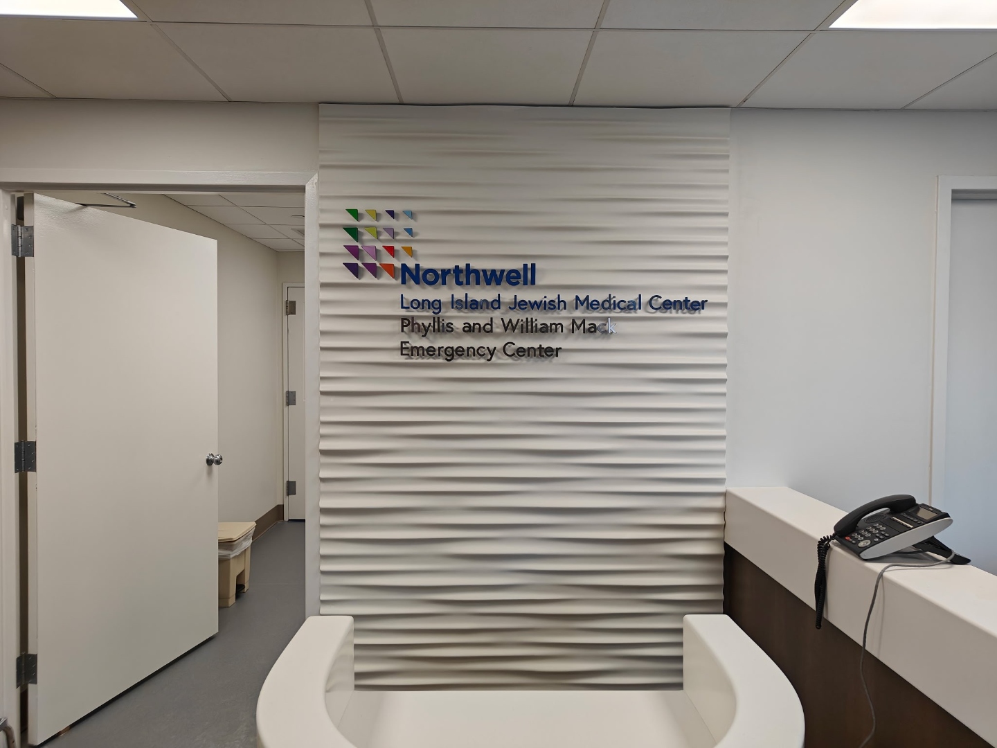 Dimensional wave-wall feature in a healthcare lobby