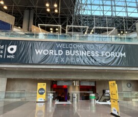 World Business Forum Experience event banner in convention center